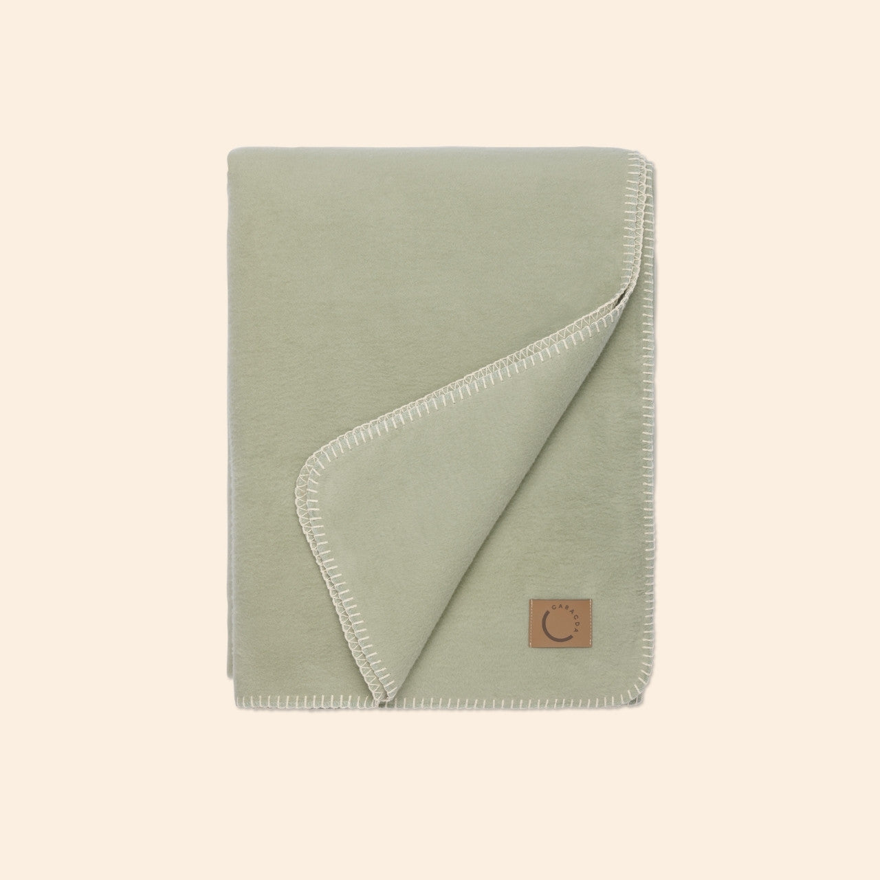 Kuscheldecke aus Baumwolle in Lindgrün (Gefaltet)