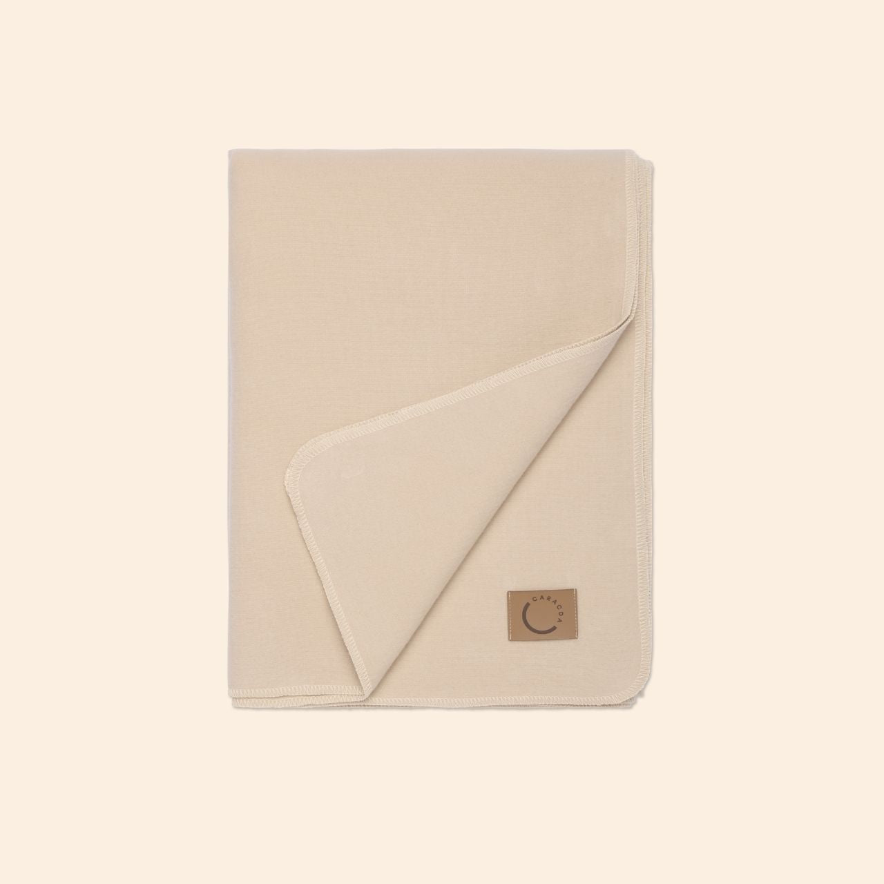 Kuscheldecke aus Baumwolle in Beige (Gefaltet)